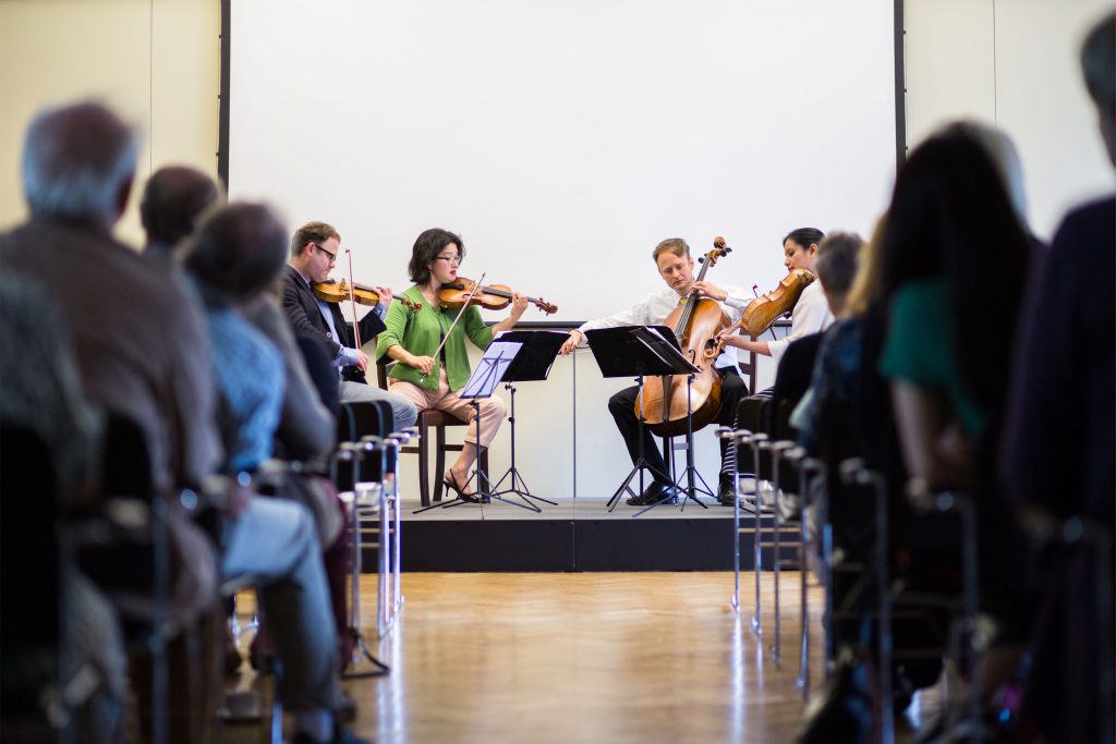 Audience enjoying a performance by the Villiers Quartet