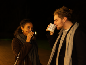 Students enjoying hot chocolate at Fireworks display