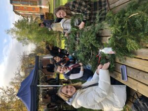 Students making Christmas wreaths