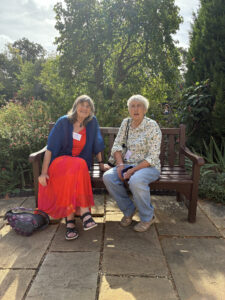 Alumni seated on the terrace