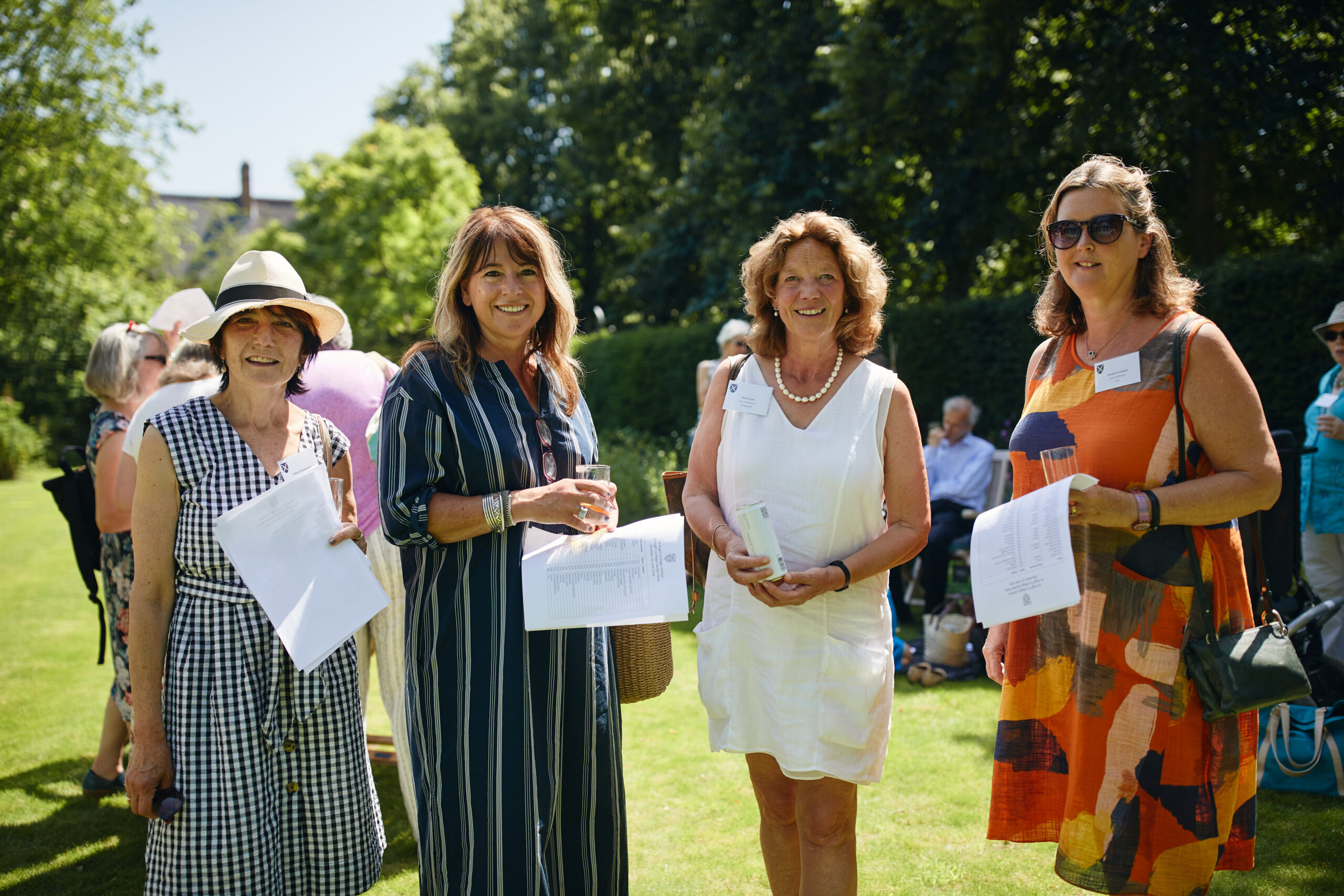 4 alumni at Summer party