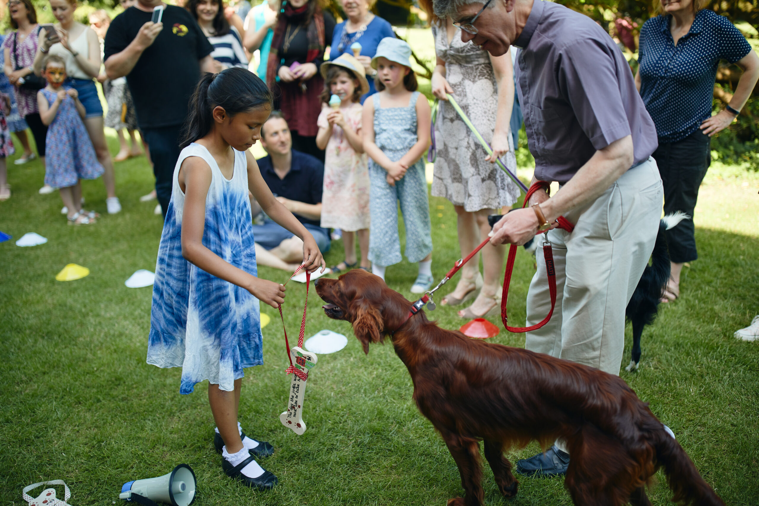 Guest with dog at summer party