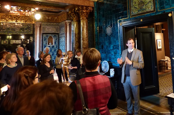 Senior Curator, Daniel Robbins and event attendees inside the Leighton House Museum