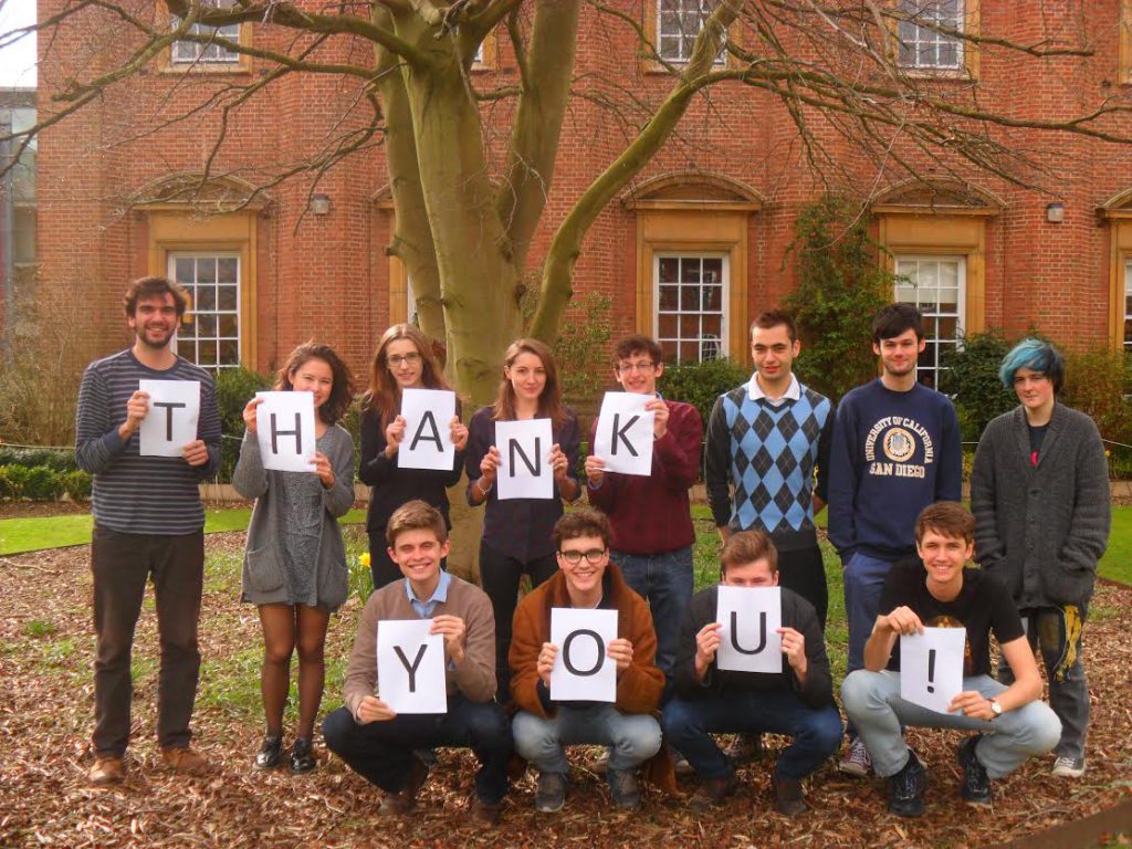 Telethon 2015 callers holding up letters that spell 'Thank You!'